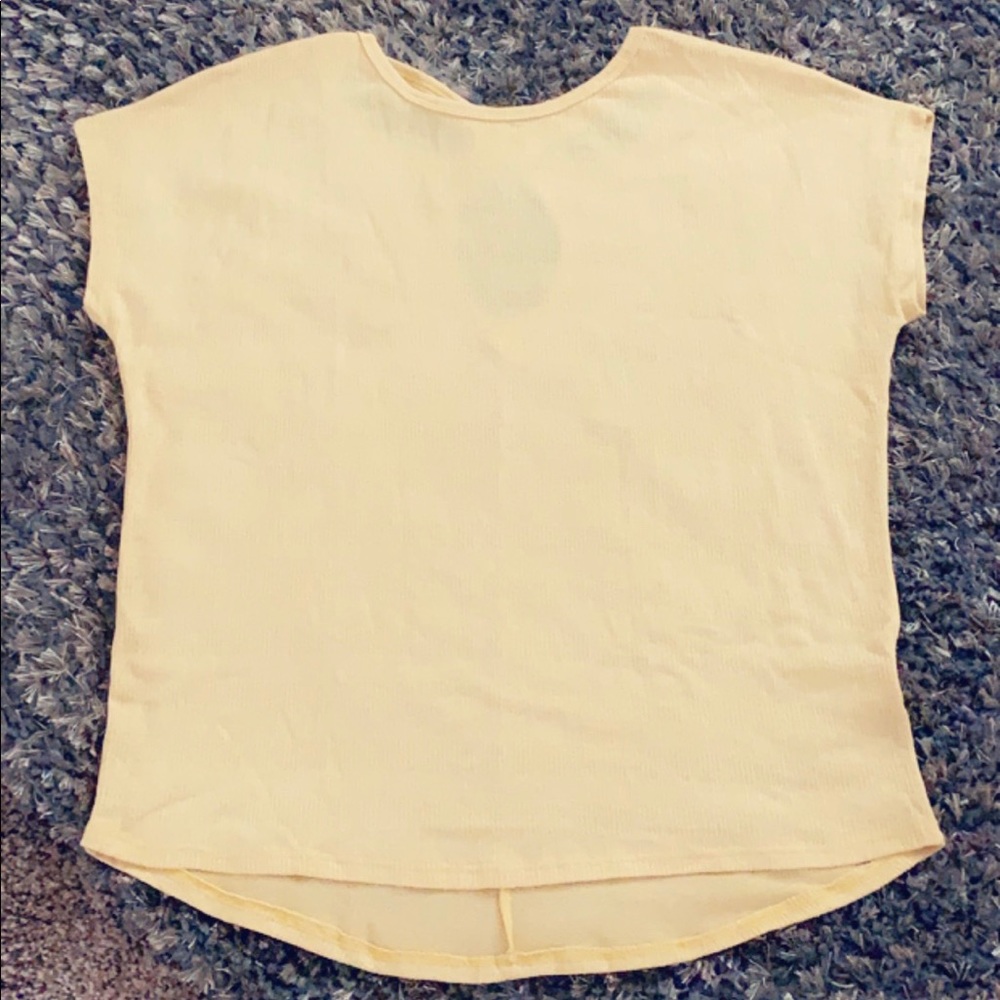 Yellow short sleeve top with cross back